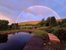 Schwimmteich in Abendstimmung mit Regenbogen 